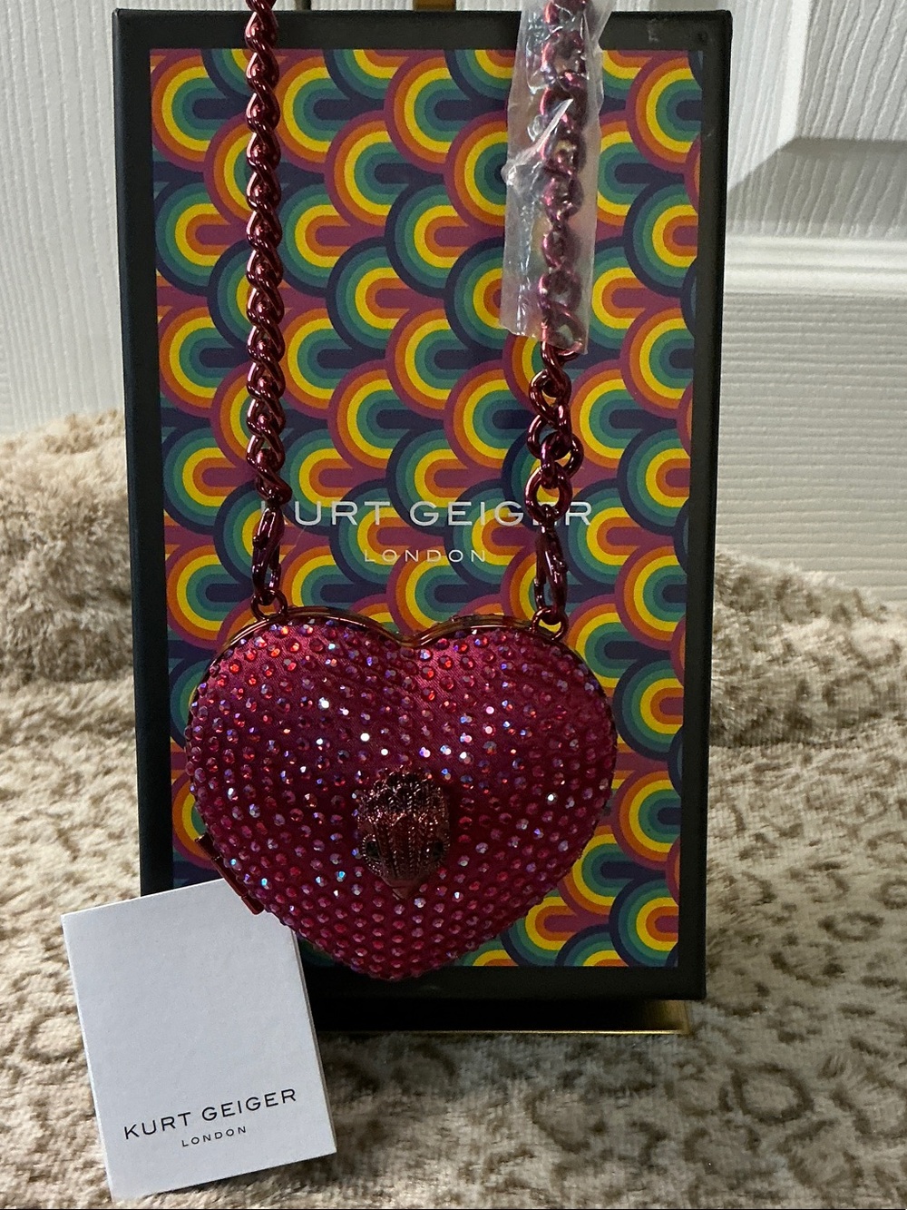 Kurt Geiger London Micro Heart Clutch Bag, Covered in Sparkling Pink Crystals
